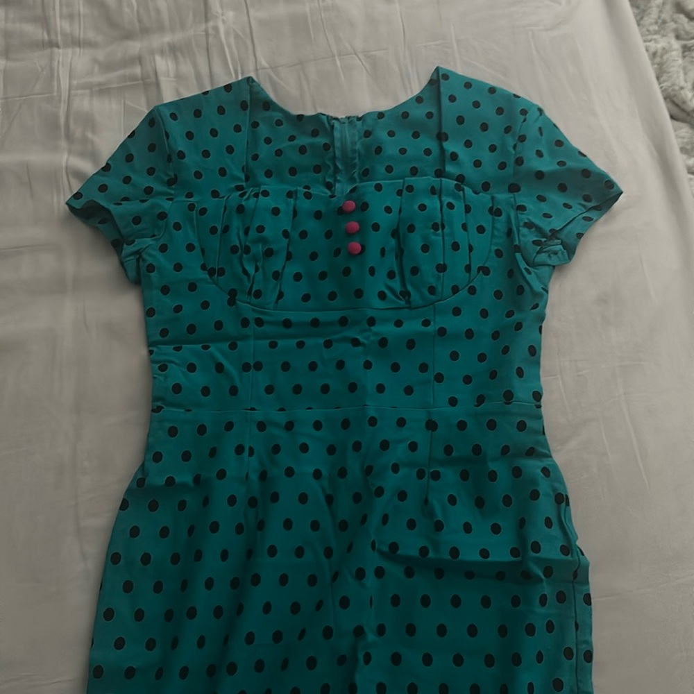 Pin up like dress in teal with black polka dots. Non branded. Worn once.